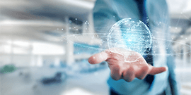 Businessman holding a digital globe – symbolizing global connectivity and innovation in Open Banking Worldwide